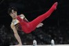 Shinnosuke Oka, of Japan, performs on the pommel horse during the men's artistic gymnastics all-around finals in Bercy Arena at the 2024 Summer Olympics, Wednesday, July 31, 2024, in Paris, France. (AP Photo/Francisco Seco)