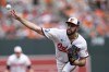 Baltimore Orioles starting pitcher Grayson Rodriguez delivers during the first inning of a baseball game against the Toronto Blue Jays, Wednesday, July 31, 2024, in Baltimore. (AP Photo/Stephanie Scarbrough)