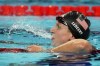 Katie Ledecky, of the United States, reacts after winning the women's 1500-meter freestyle final at the 2024 Summer Olympics, Wednesday, July 31, 2024, in Nanterre, France. (AP Photo/Ashley Landis)