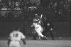 FILE - Atlanta Braves' Hank Aaron eyes the flight of the ball after hitting his 715th career homer in a game against the Los Angeles Dodgers in Atlanta, Ga., Monday, April 8, 1974. The Atlanta Braves launched Hank Aaron Week on Wednesday, July 31, 2024, when the U.S. Postal Service dedicated a commemorative forever stamp honoring Aaron during a ceremony at Truist Park. The stamp was announced on April 8, the 50th anniversary of Aaron's record-breaking 715th home run. (AP Photo/Harry Harris, File)
