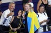 Gold medalist Sarah Sjoestroem, of Sweden, poses after the women's 100-meter freestyle final at the 2024 Summer Olympics, Wednesday, July 31, 2024, in Nanterre, France.(AP Photo/Martin Meissner)