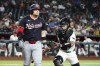 Arizona Diamondbacks catcher Jose Herrera, right, tags out Washington Nationals' Travis Blankenhorn, left, after a dropped third strike during the second inning of a baseball game Wednesday, July 31, 2024, in Phoenix. (AP Photo/Ross D. Franklin)