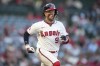 Los Angeles Angels' Zach Neto (9) runs to first base during the second inning of a baseball game against the Colorado Rockies in Anaheim, Calif., Wednesday, July 31, 2024. (AP Photo/Eric Thayer)