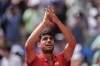 Carlos Alcaraz of Spain celebrates his victory over Tommy Paul, of United States during their men's quarter-final match at the Roland Garros stadium, at the 2024 Summer Olympics, Thursday, Aug. 1, 2024, in Paris, France. (AP Photo/Manu Fernandez)