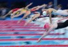 Canada's Canada's Summer McIntosh, third left, competes during the Women's 200m Butterfly semifinal at the Paris Summer Olympics in Nanterre, France on Wednesday, July 31, 2024. THE CANADIAN PRESS/Nathan Denette