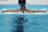 Summer McIntosh, of Canada, competes in the women's 200-meter butterfly final at the 2024 Summer Olympics, Thursday, Aug. 1, 2024, in Nanterre, France. (AP Photo/Matthias Schrader)