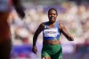 Sharon Firisua, of Solomon Islands, competes in the women's 100-meter run at the 2024 Summer Olympics, Friday, Aug. 2, 2024, in Saint-Denis, France. (AP Photo/Petr David Josek)