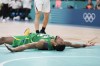 Bruno Caboclo, of Brazil, reacts after a turnover against Japan in a men's basketball game at the 2024 Summer Olympics, Friday, Aug. 2, 2024, in Villeneuve-d'Ascq, France. (AP Photo/Mark J. Terrill)