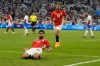 Egypt's Ibrahim Adel (10) reacts after scoring his side's first goal during a men's quarterfinal soccer match between Egypt and Paraguay at the 2024 Summer Olympics, Friday, Aug. 2, 2024, at Marseille Stadium in Marseille, France. (AP Photo/Julio Cortez)