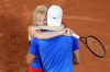 Czech Republic's Tomas Machac and Katerina Siniakova celebrate as they defeat China's Wang Xinyu and Zhang Zhizhen during the Mixed Doubles final tennis match at the Roland Garros stadium during the 2024 Summer Olympics, Friday, Aug. 2, 2024, in Paris, France. (AP Photo/Manu Fernandez)