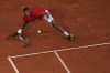 Canada's Felix Auger-Aliassime returns a forehand shot to Italy's Lorenzo Musetti during their men's singles bronze medal match, at the 2024 Summer Olympics, in Paris, Saturday, Aug. 3, 2024. THE CANADIAN PRESS/AP-Andy Wong
