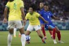 Brazil's Duda Sampaio vies for the ball with France's Grace Geyoro during a women's quarterfinal soccer match between France and Brazil, at La Beaujoire Stadium, during the 2024 Summer Olympics Saturday, Aug. 3, 2024, in Nantes, France. (AP Photo/Jeremias Gonzalez)