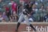 Miami Marlins Xavier Edwards swings for a strike in the first inning of a baseball game against the Atlanta Braves, Saturday, Aug. 3, 2024, in Atlanta. (AP Photo/Jason Allen)
