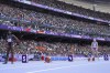 Helene Parisot, right, of France, and Daryll Neita, left, of Britain, stand near the empty start blocks for Shericka Jackson, of Jamaica, ahead of their women's 200-meter heat at the 2024 Summer Olympics, Sunday, Aug. 4, 2024, in Saint-Denis, France. (AP Photo/Bernat Armangue)