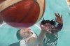 Ezinne Kalu (23), of Nigeria, shoots over Natalie Achonwa (11), of Canada, in a women's basketball game at the 2024 Summer Olympics, Sunday, Aug. 4, 2024, in Villeneuve-d'Ascq, France. (AP Photo/Mark J. Terrill, Pool)