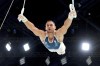 Samir Ait Said, of France, competes during the men's artistic gymnastics individual rings finals at Bercy Arena at the 2024 Summer Olympics, Sunday, Aug. 4, 2024, in Paris, France. (AP Photo/Charlie Riedel)