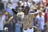 San Diego Padres' Jurickson Profar reacts after hitting a solo home run during the fifth inning of a baseball game against the Colorado Rockies, Sunday, Aug. 4, 2024, in San Diego. (AP Photo/Denis Poroy)