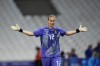 Germany goalkeeper Ann-Katrin Berger reacts during penalty shoot-out during a women's quarterfinal soccer match between Canada and Germany at the 2024 Summer Olympics, Saturday, Aug. 3, 2024, at Marseille Stadium in Marseille, France. (AP Photo/Julio Cortez)