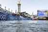 Athletes jump into the water to compete in the swimming race in the Seine river, during the mixed relay triathlon, at the 2024 Olympic Games, in Paris, France, Monday, Aug. 5, 2024. (Martin Bureau/Pool Photo via AP)