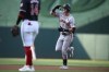 San Francisco Giants' Tyler Fitzgerald, right, celebrates after his home run as he rounds the bases during the first inning of a baseball game against the Washington Nationals, Monday, Aug. 5, 2024, in Washington. (AP Photo/Nick Wass)