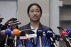 South Korean badminton star An Se-young, the women's singles winner at the Paris Olympics, speaks to the media at Incheon International Airport in Incheon, South Korea, Wednesday, Aug. 7, 2024. (AP Photo/Ahn Young-joon)