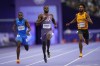 Noah Lyles, of the United States, competes in the men's 200-meter semifinal at the 2024 Summer Olympics, Wednesday, Aug. 7, 2024, in Saint-Denis, France. (AP Photo/Petr David Josek)