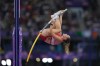 Alysha Newman, of Canada, competes in the women's pole vault final at the 2024 Summer Olympics on Wednesday, Aug. 7, 2024, in Saint-Denis, France. Alysha Newman accomplished what only two other Canadian athletes before have ever done, win an Olympic pole vault medal. THE CANADIAN PRESS/Christinne Muschi