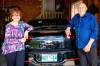 NIC ADAM / FREE PRESS
                                Shelley Kowalchuck (left) and Gary Pedersen with their Chevrolet Volt in the garage of their home.