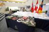 ERIK PINDERA/FREE PRESS FILES
                                A large quantity of drugs, cash and outlaw motorcycle club patched clothing seized as part of Project Divergent, is displayed at RCMP D Division Headquarters in 2022.