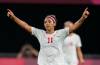 Canada&rsquo;s Desiree Scott celebrates at the end of a women&rsquo;s soccer match against Chile at the 2020 Summer Olympics, held in 2021, in Sapporo, Japan. (Silvia Izquierdo / The Associated Press files)