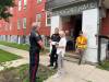 MALAK ABAS / WINNIPEG FREE PRESS
                                St. Boniface Street Links director Marion Willis talks with police after receiving a ticket for trespassing inside 285 College Ave.