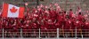 The boat carrying team Canada makes its way down the Seine in Paris, France, during the opening ceremony of the 2024 Summer Olympics, Friday, July 26, 2024. (AP Photo/Lindsey Wasson)