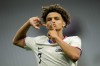United States' Kevin Paredes celebrates scoring his side's 3rd goal during the men's Group A soccer match between the United States and Guinea, at Geoffroy-Guichard Stadium, during the 2024 Summer Olympics, Tuesday, July 30, 2024, in Saint-Etienne, France. (AP Photo/Silvia Izquierdo)