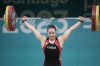 Canada's Maude Charron competes in the women's weightlifting 59Kg at the Pan American Games in Santiago, Chile, Sunday, Oct. 22, 2023. Charron's journey after her weightlifting gold in Tokyo included a 