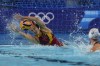 Spain's Martina Terre saves a penalty by Netherland's Brigitte Sleeking during penalties shoot out of a women's Water Polo semifinal match between Netherlands and Spain at the 2024 Summer Olympics, Thursday, Aug. 8, 2024, in Paris, France. (AP Photo/Luca Bruno)