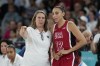 United States' Cheryl Reeve talks with Diana Taurasi (12) during a women's quarterfinal game against Nigeria at Bercy Arena at the 2024 Summer Olympics, Wednesday, Aug. 7, 2024, in Paris, France. (AP Photo/Mark J. Terrill)
