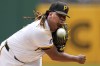 Pittsburgh Pirates starting pitcher Luis L. Ortiz delivers during the first inning of a baseball game against the San Diego Padres in Pittsburgh, Thursday, Aug. 8, 2024. (AP Photo/Gene J. Puskar)