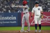 Los Angeles Angels' Jo Adell (7) celebrates after hitting a three-run double during the fifth inning of a baseball game against the New York Yankees, Thursday, Aug. 8, 2024, in New York. (AP Photo/Bryan Woolston)