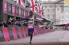 FILE - Kenya's Kelvin Kiptum crosses the finish line to win the men's race at the London Marathon in London, Sunday, April 23, 2023.(AP Photo/Alberto Pezzali, File)