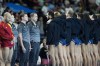Italian players listen the nation anthems with their backs turned as a protest for the Italy-Hungary refereeing controversy, prior to a men's 5th and 8th place classification match between Italy and Spain, at the 2024 Summer Olympics, Friday, Aug. 9, 2024, in Paris. (AP Photo/Luca Bruno)