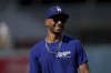 Los Angeles Dodgers' Mookie Betts smiles during warm ups before a baseball game against Philadelphia Phillies in Los Angeles, Wednesday, Aug. 7, 2024. (AP Photo/Eric Thayer)