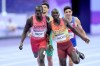 Canada's Marco Arop, left, and Kenya's Emmanuel Wanyonyi come in for a close finish as they compete in the men's 800m final event during the Paris Summer Olympics in Saint-Denis, France, Saturday, Aug. 10, 2024. THE CANADIAN PRESS/Nathan Denette