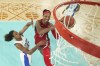 United States' A'ja Wilson, (9) shoots for a basket as Marieme Badiane (22), attempts tp block, during a women's gold medal basketball game between the United States and France at Bercy Arena at the 2024 Summer Olympics, Sunday, Aug. 11, 2024, in Paris, France. (Gregory Shamus/Pool Photo via AP)