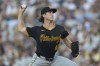 Pittsburgh Pirates starting pitcher Jake Woodford works against a San Diego Padres batter during the second inning of a baseball game Monday, Aug. 12, 2024, in San Diego. (AP Photo/Gregory Bull)