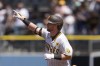 San Diego Padres' Jake Cronenworth celebrates after hitting a three-run home run during the first inning of a baseball game against the Pittsburgh Pirates Wednesday, Aug. 14, 2024, in San Diego. (AP Photo/Gregory Bull)