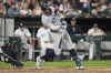 New York Yankees designated hitter Aaron Judge hits a double during the seventh inning of a baseball game against the Chicago White Sox, Wednesday, Aug. 14, 2024, in Chicago. (AP Photo/Erin Hooley)