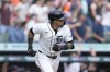Detroit Tigers' Javier Báez watches his two-run home run during the eighth inning of a baseball game against the Seattle Mariners, Thursday, Aug. 15, 2024, in Detroit. (AP Photo/Carlos Osorio)