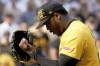 Pittsburgh Pirates relief pitcher Aroldis Chapman reacts after getting the final out of a win over the Tampa Bay Rays in a baseball game Saturday, June 22, 2024, in Pittsburgh. A business subsidiary of the Major League Baseball Players Association sued the Pittsburgh Pirates’ parent company and the grocery chain Sheetz Inc. alleging unlicensed use of players’ names and images on social media. (AP Photo/Matt Freed, File)