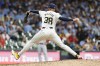 Milwaukee Brewers' Devin Williams pitches during the ninth inning of a baseball game against the Cincinnati Reds, Saturday, Aug. 10, 2024, in Milwaukee. (AP Photo/Aaron Gash)