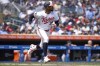 Minnesota Twins' Byron Buxton runs the bases after hitting a double against the Cleveland Guardians during the sixth inning of the first game of a baseball doubleheader, Friday, Aug. 9, 2024, in Minneapolis. (AP Photo/Matt Krohn)